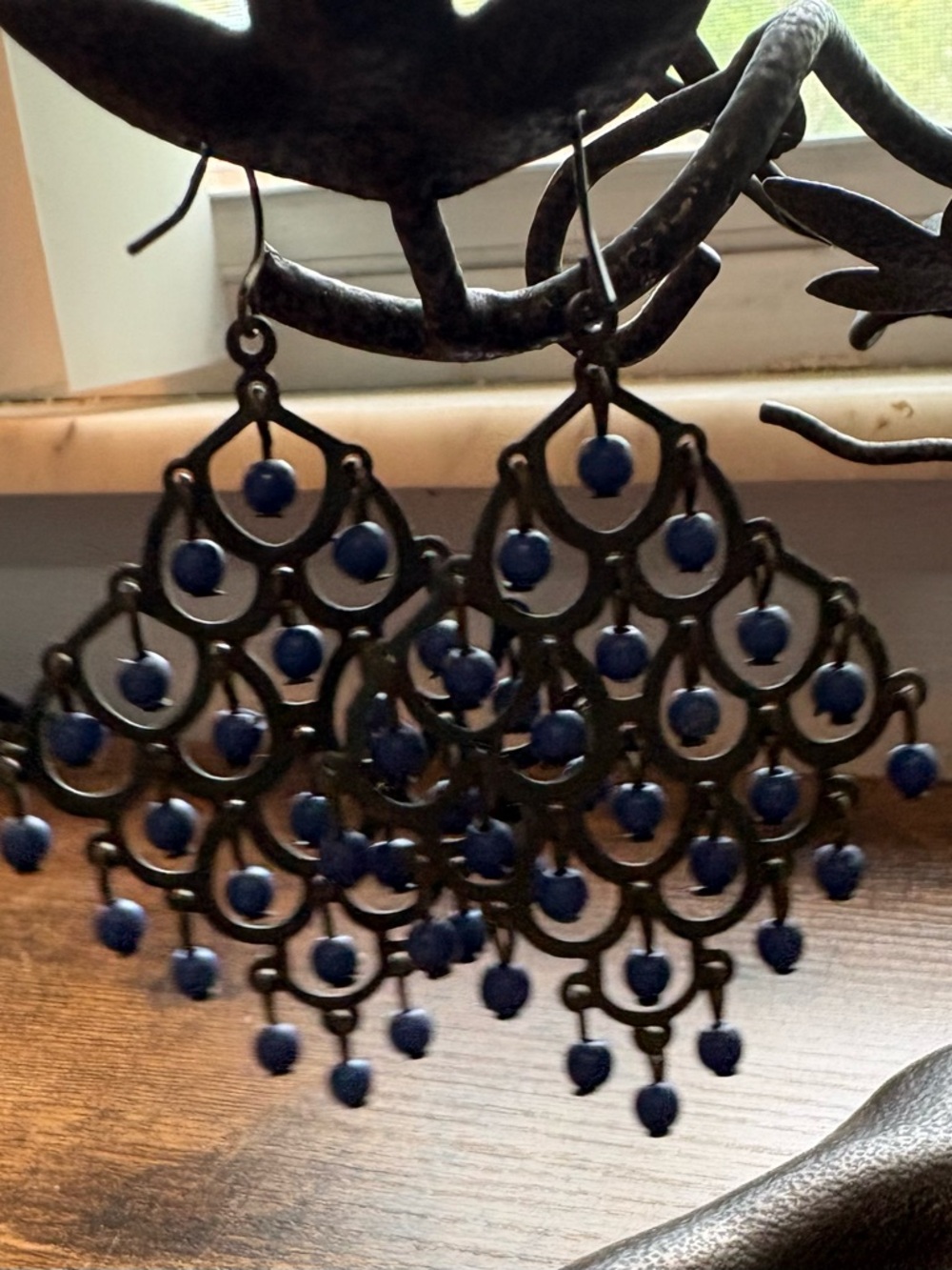 Lightweight blue beaded brass looking chandelier style earrings